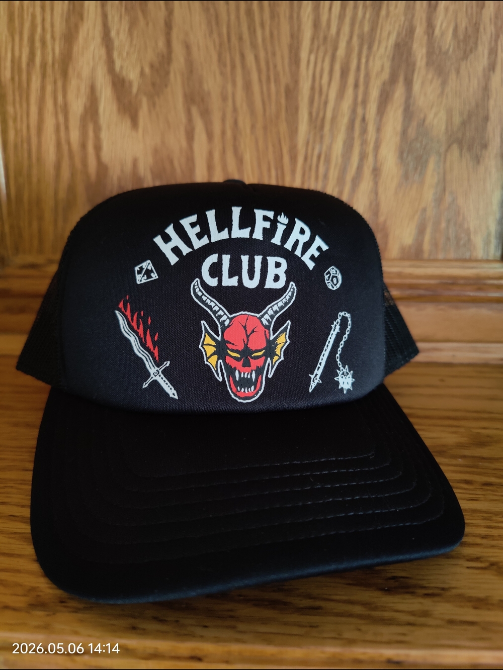 Netflix Black Hellfire Club Trucker Hat with Red and Yellow Logo